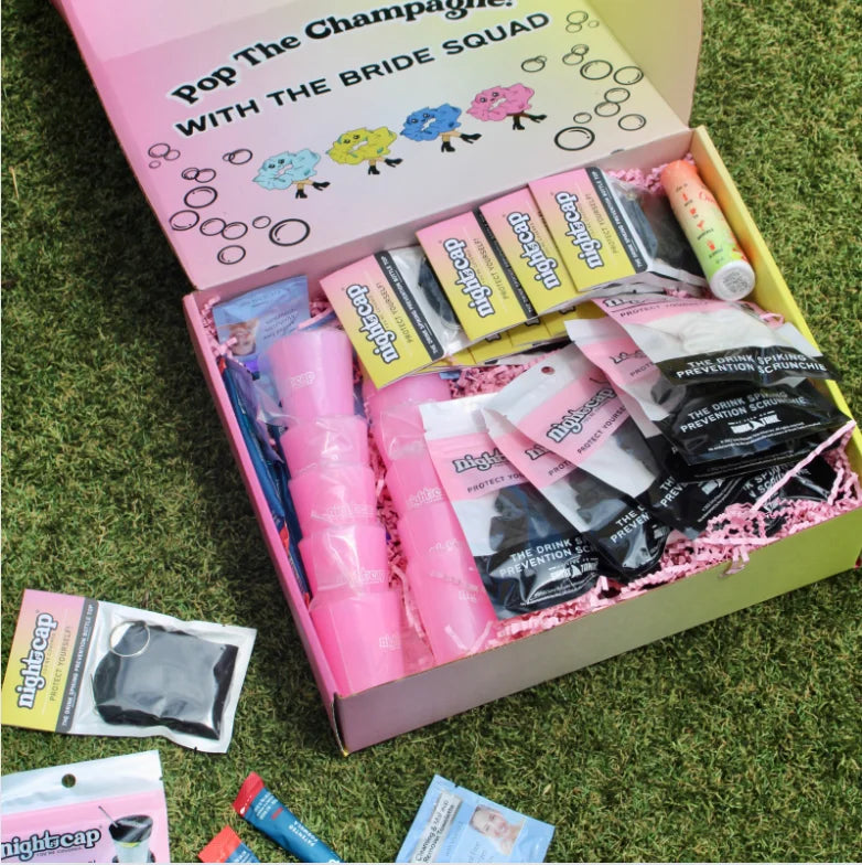NightCap Bachelorette Box featuring drink spiking prevention scrunchies, cup covers, safety accessories, and party favors for bridal celebrations and bachelorette parties.