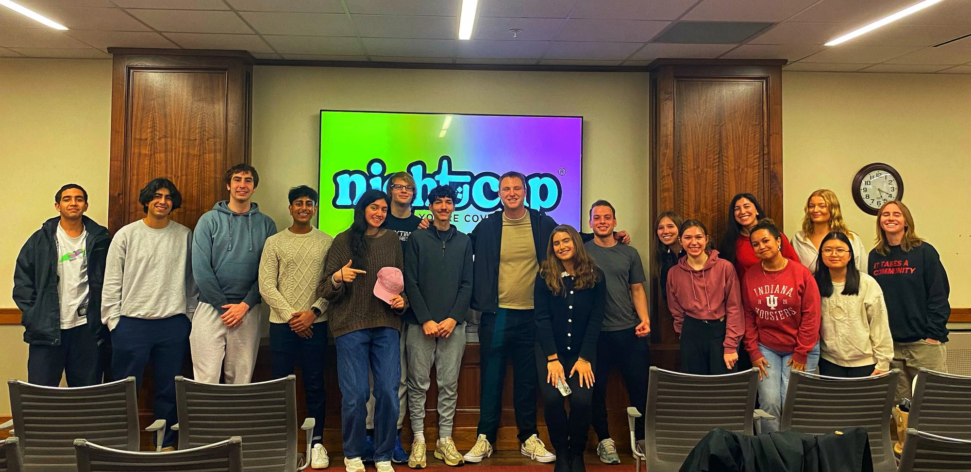 Group of university students posing with the NightCap founders after a drink safety and entrepreneurship presentation.